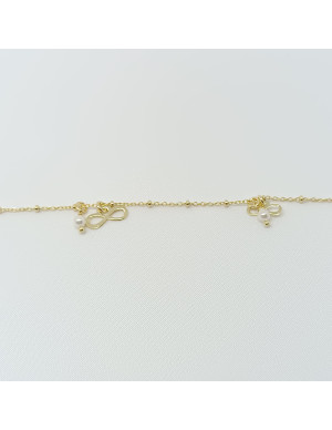 Pulseira  pérolas e símbolos