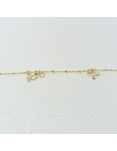 Pulseira  pérolas e símbolos